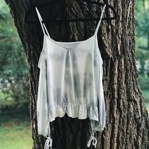 A spaghetti strap and off the shoulder soft tee